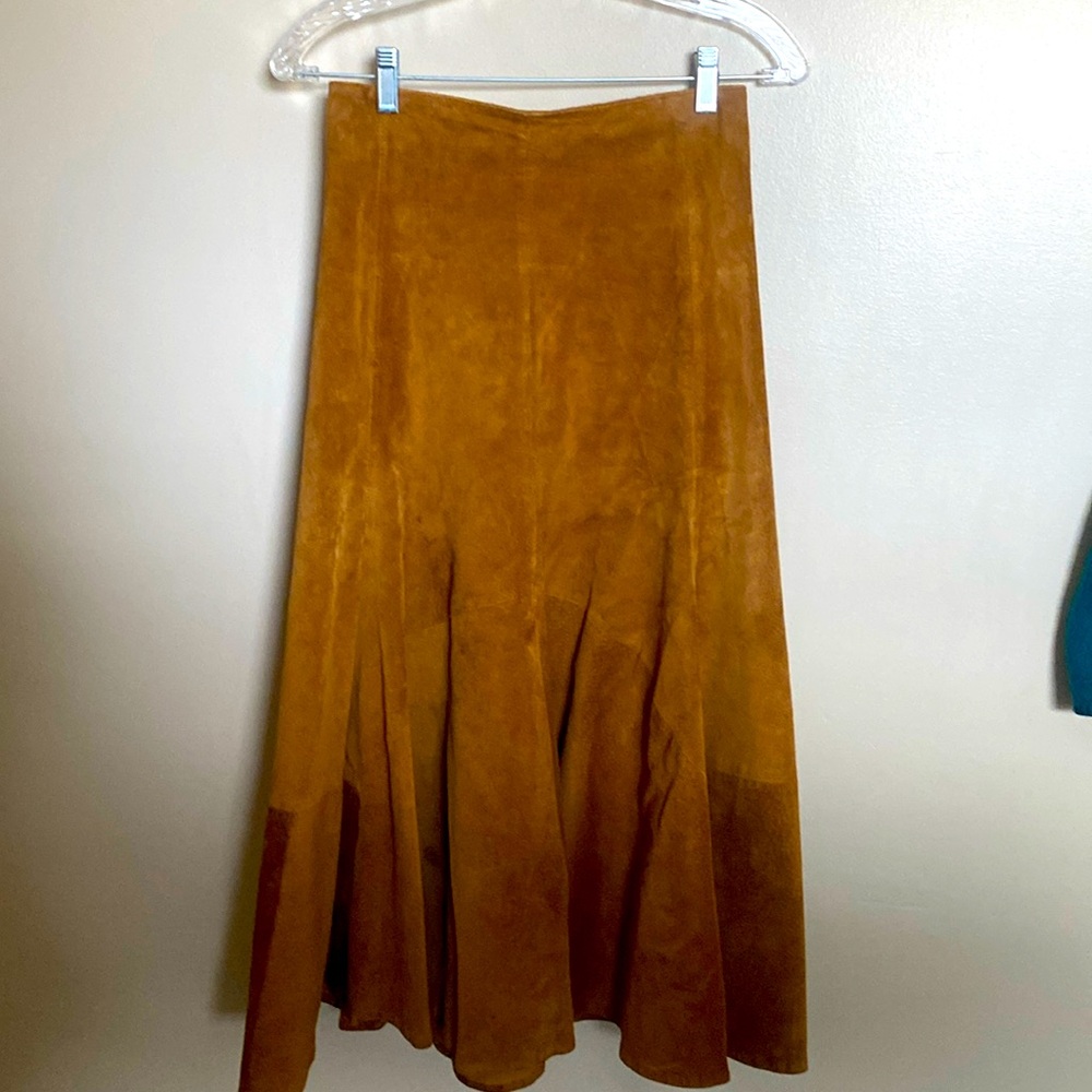 Long rust colored suede skirt. High waisted and fully lined.